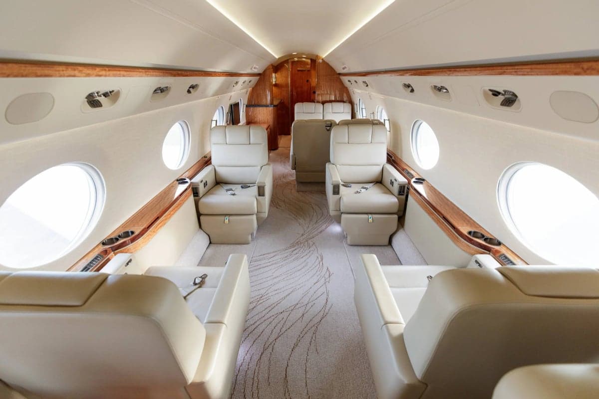 A view of the Gulfstream G550 cabin showing the seating arrangement and interior design.