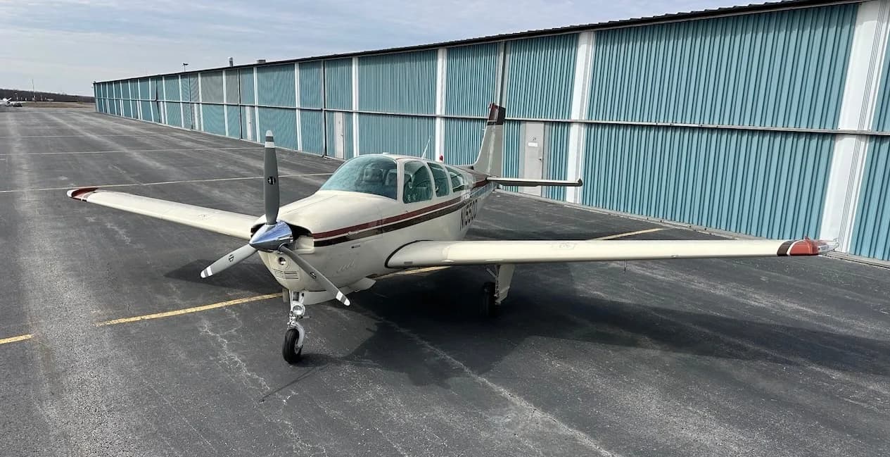 Front view of a Beechcraft Bonanza N1550D on the tarmac.