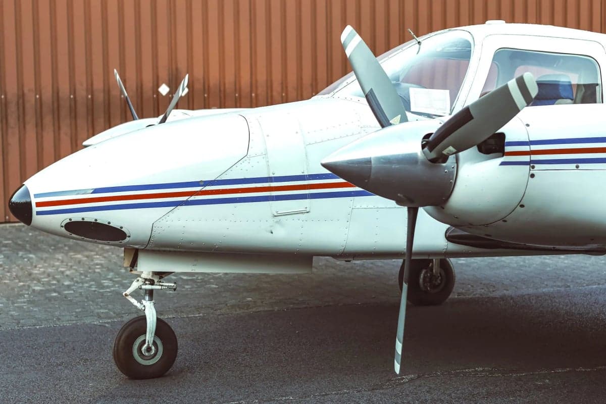 Close-up of the nose and propeller of the Piper Seminole.