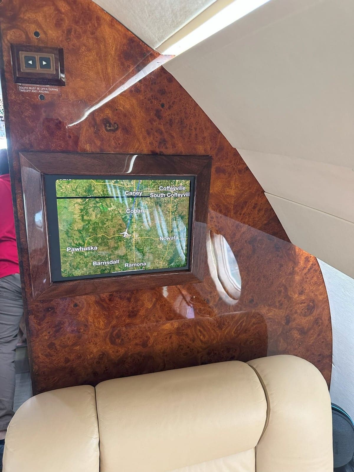 View of the Falcon 50 cabin with leather seats and table.