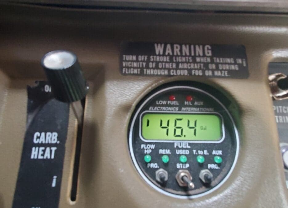 Close-up of the aircraft's fuel gauge and carb heat control.