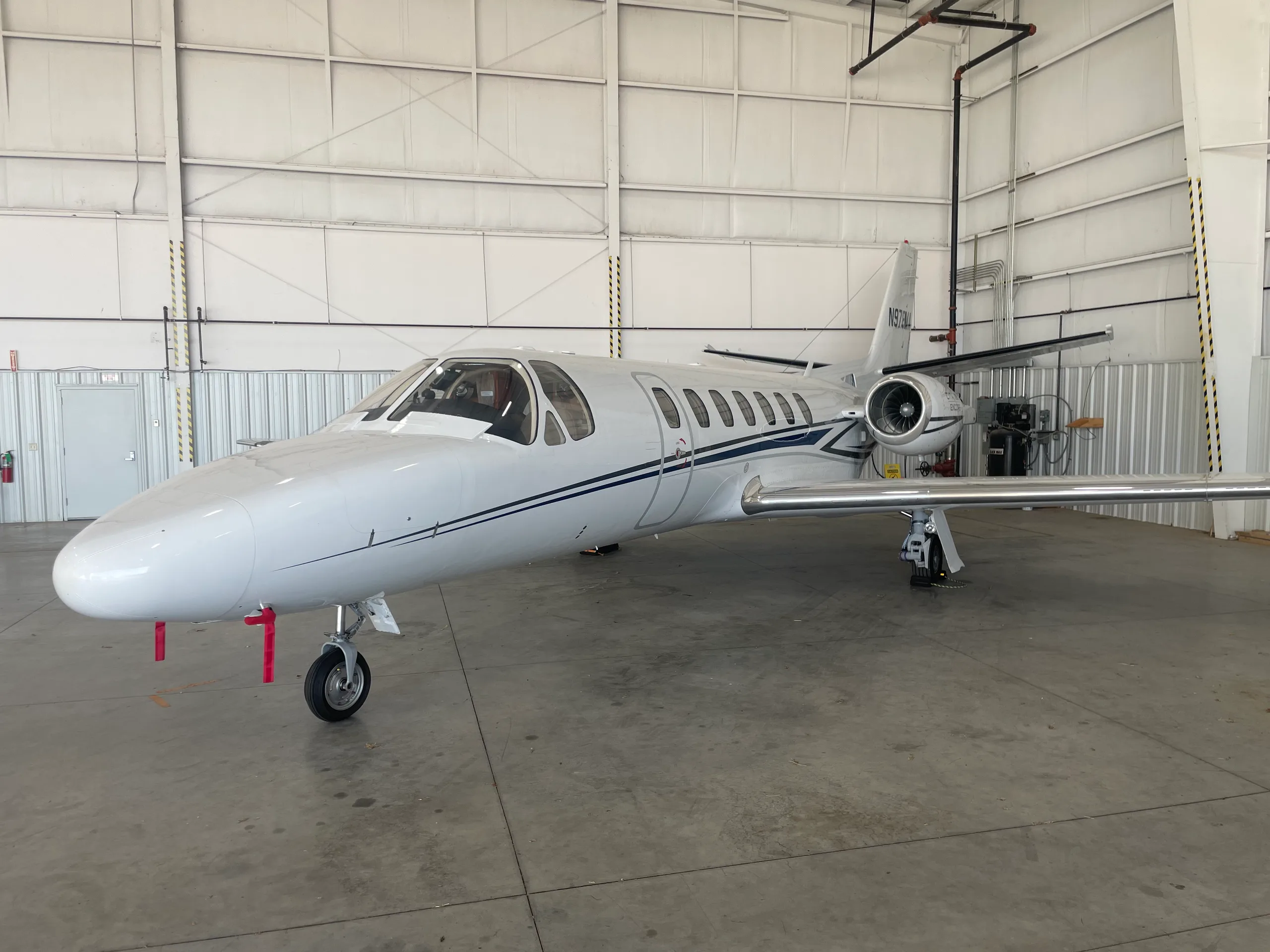 Cessna Citation in a hangar.