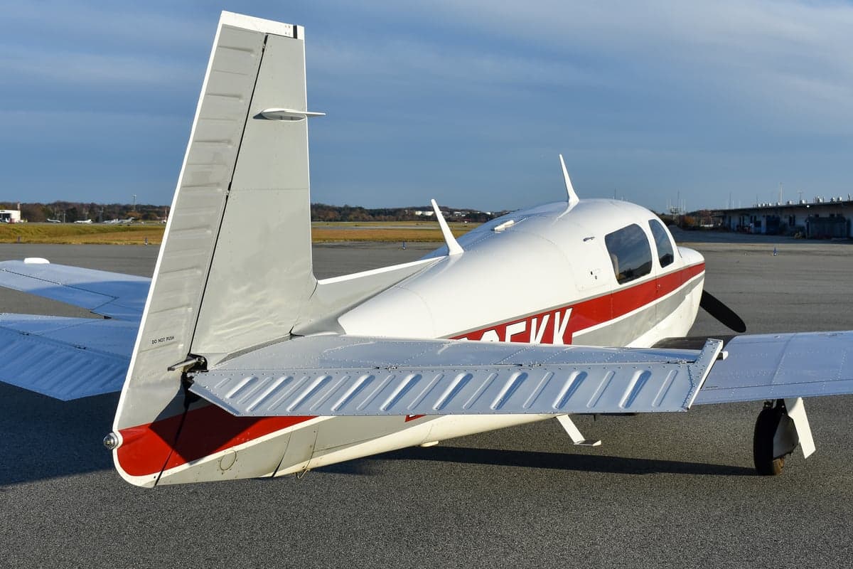 Front view of the N205KK aircraft on the tarmac.