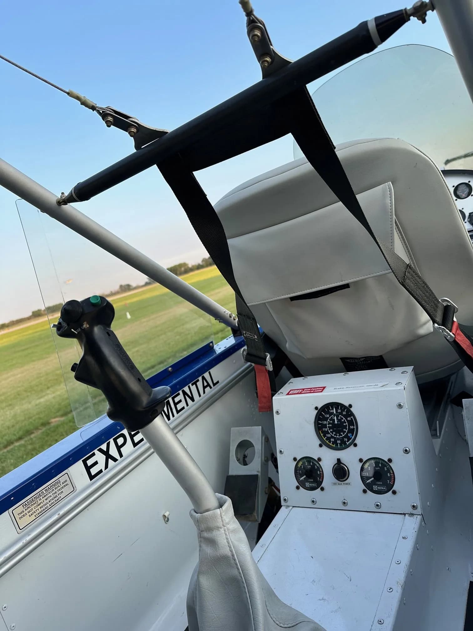 View of the Air-Cam cockpit showing the control stick and seat.