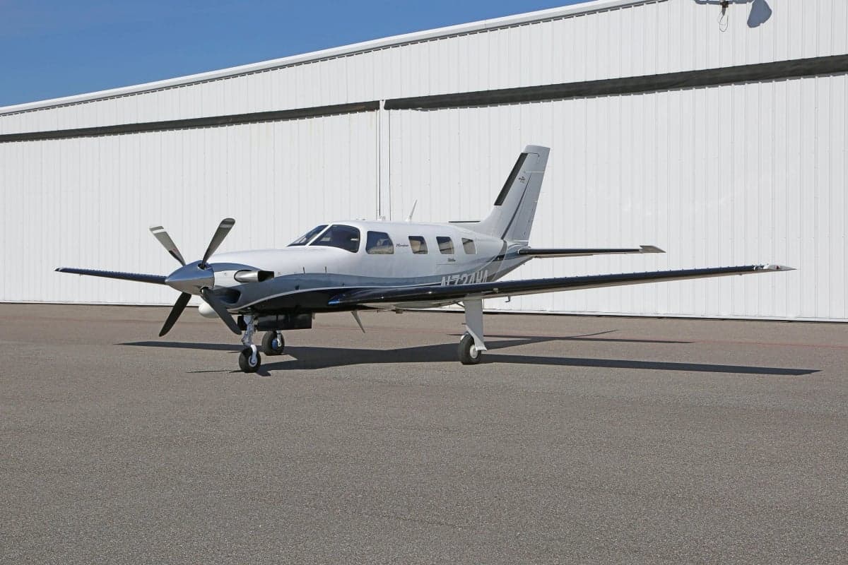 Side view of a Meridian aircraft on the ground.