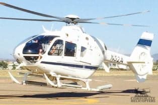 An EC135 helicopter on the ground.
