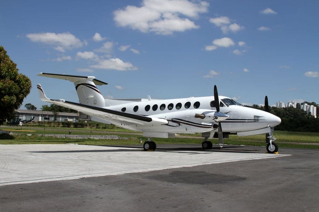 A King Air aircraft parked on the tarmac.