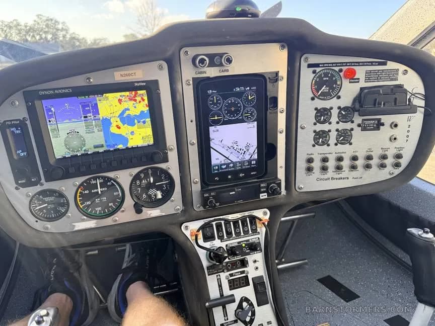 The cockpit instrument panel of a CTsw light sport aircraft, featuring a Dynon SkyView display and other gauges.