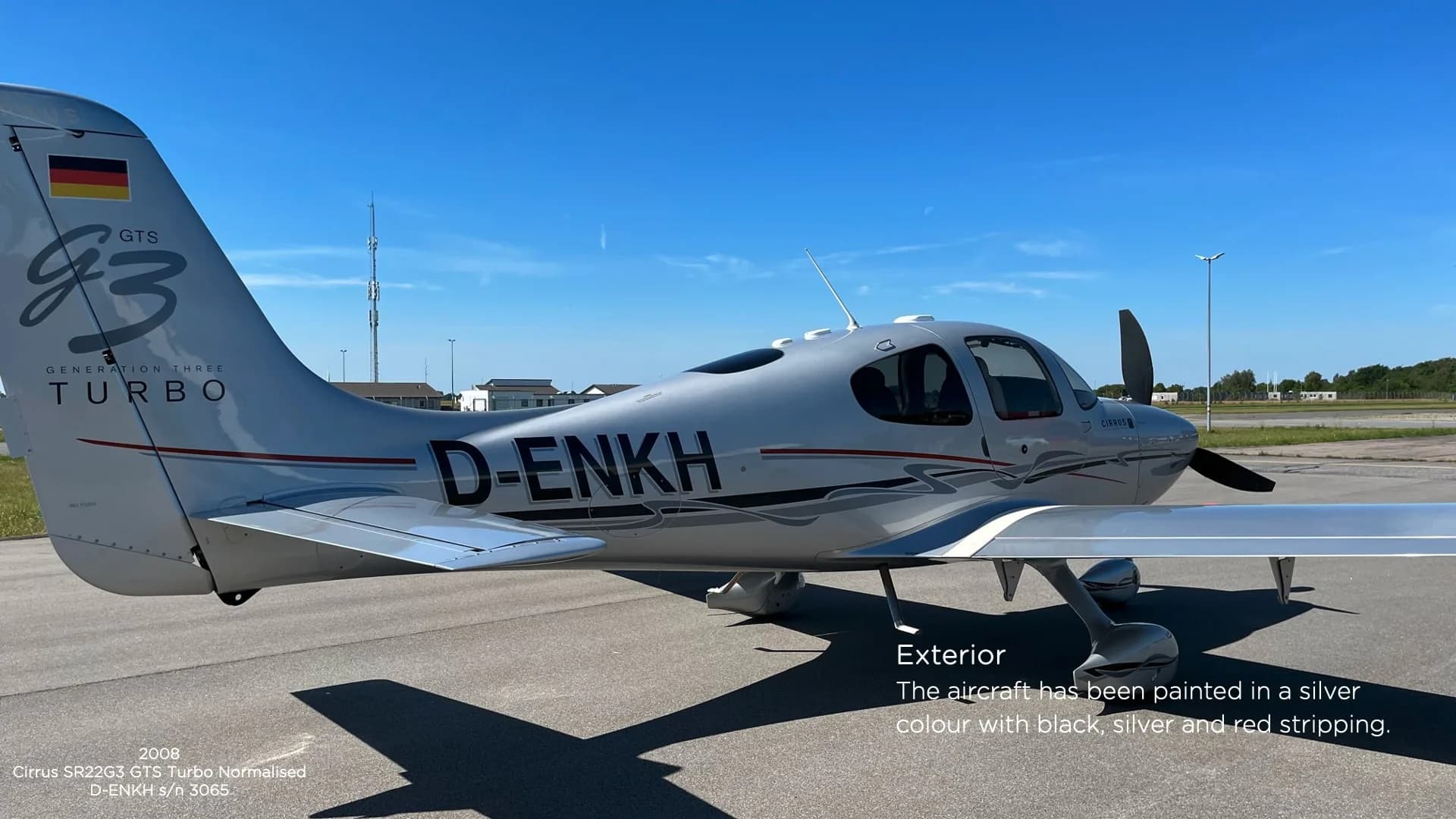 Side view of a Cirrus SR22G3 GTS Turbo Normalized, registration D-ENKH, with German flag on the tail.