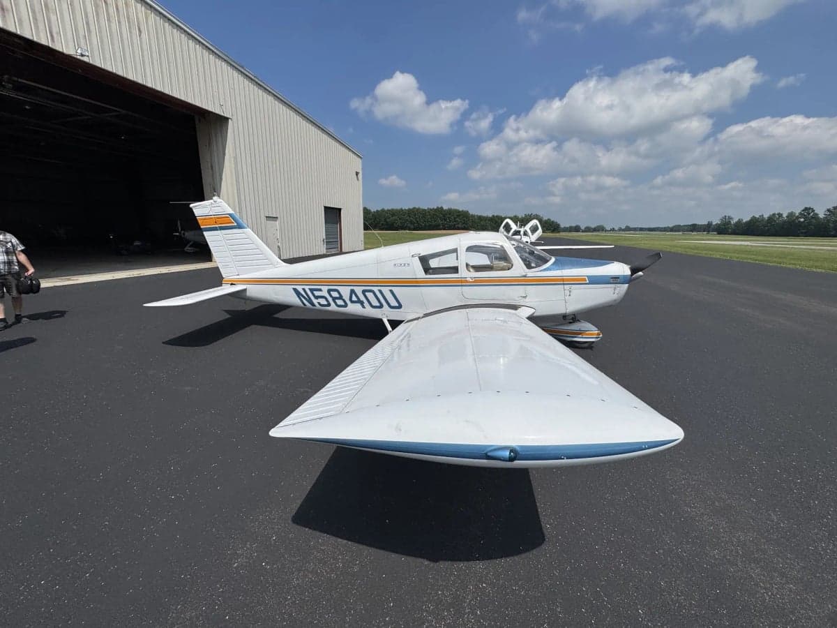 A Piper aircraft with tail number N5840U parked on the tarmac.