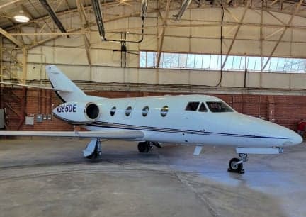 Hawker 400XP aircraft N226WH parked on the tarmac.