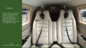 View of the aircraft's cabin seats with headsets.