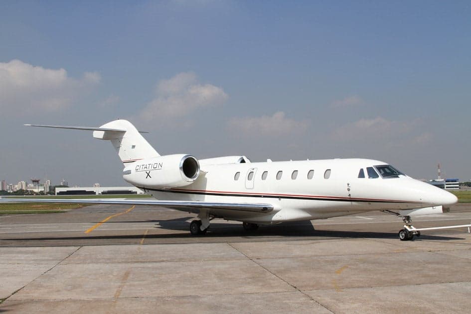 A Citation X aircraft is parked on the tarmac.