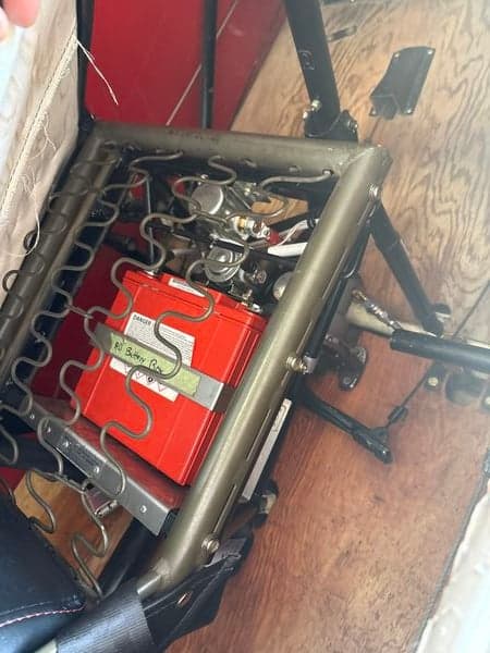 View of the aircraft seat frame and battery box.