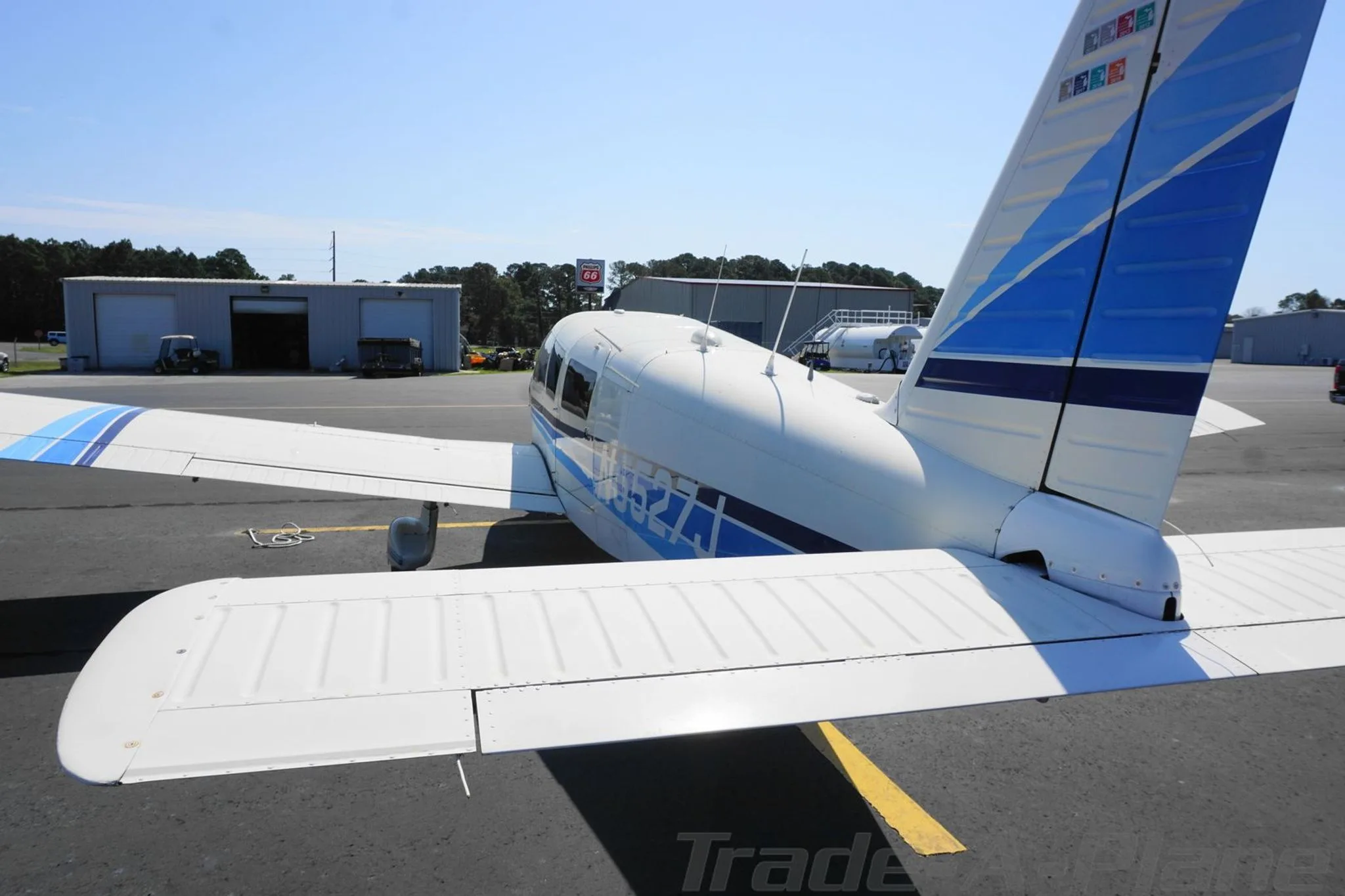 Rear view from above of the N5527J aircraft showing its tail and horizontal stabilizer.
