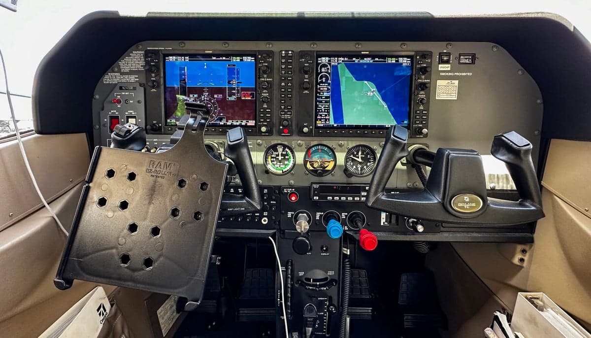 The instrument panel of the aircraft, featuring modern avionics.