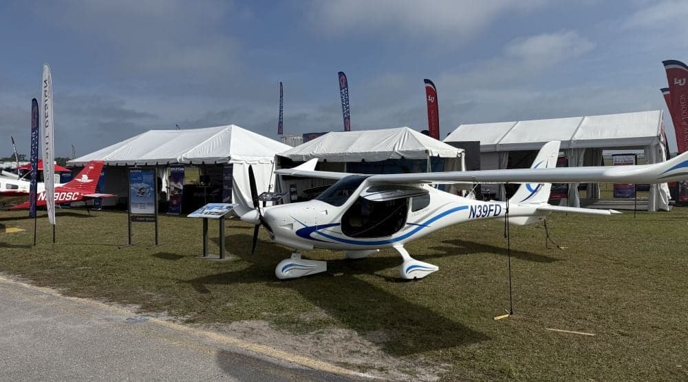 A Flight Design F2 aircraft with registration N39FD on display at an outdoor event.