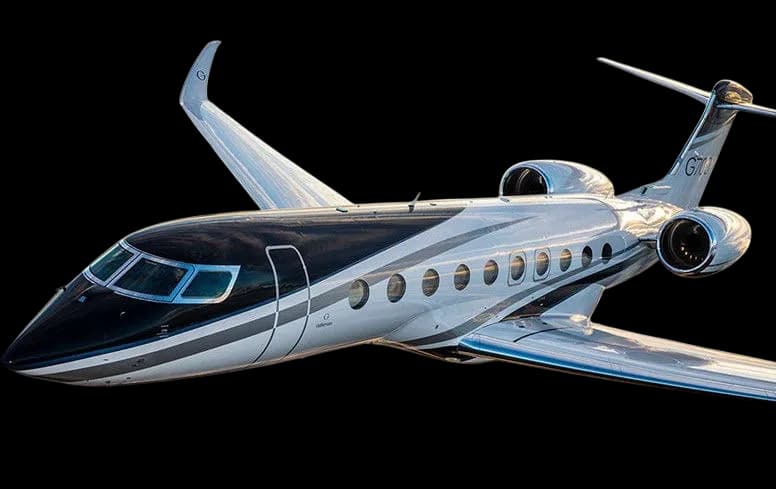 A Gulfstream G700 on a black background.