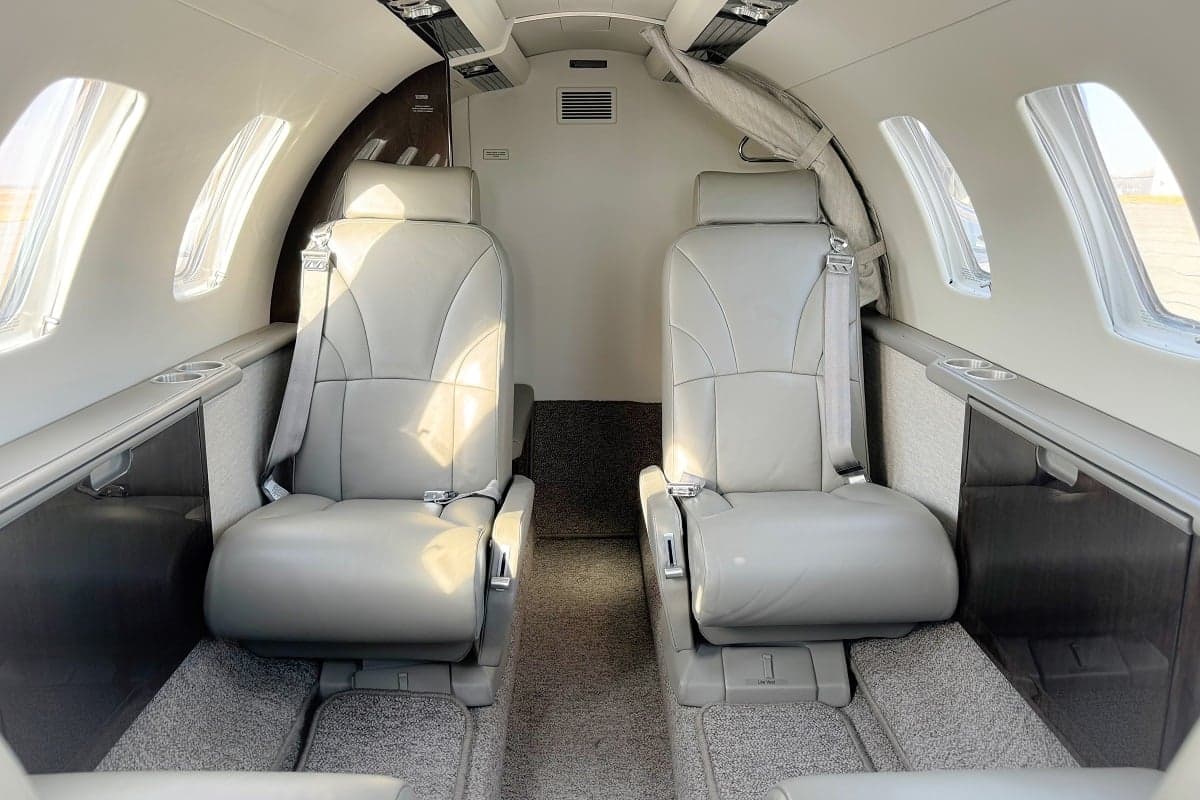 View of the interior of a Cessna Citation CJ3+ aircraft, showing the leather seats.