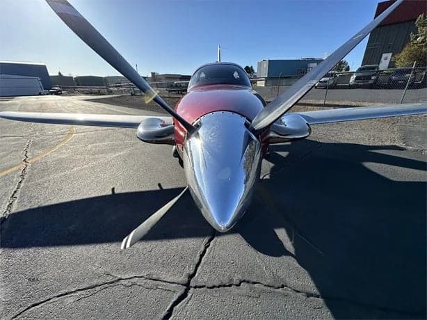 Front view of the LX7 aircraft with a polished spinner.