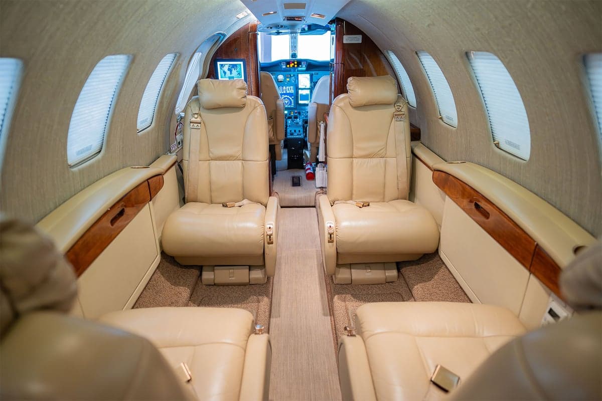 View of the aircraft interior showing the cabin seats.