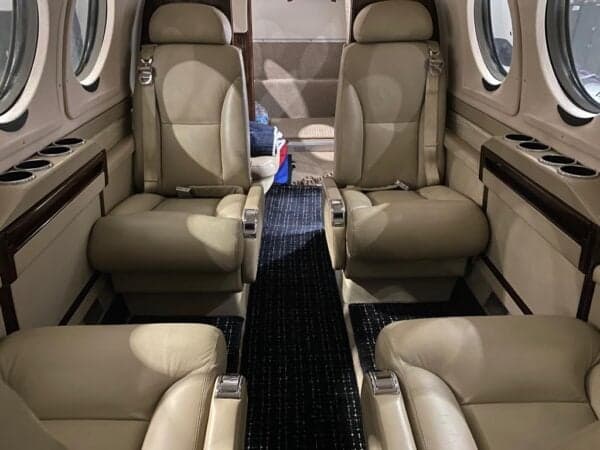 Interior view of the Beechcraft King Air 350 cabin with leather seats.