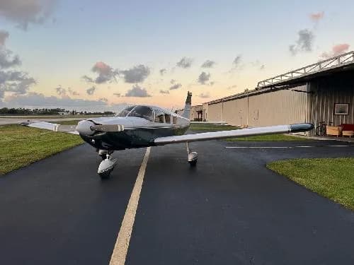 Front view of Piper PA-28-181 Archer II aircraft N1435T on the tarmac.
