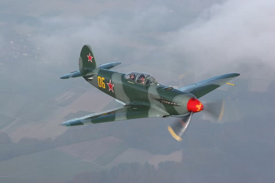 Yak-3 in flight above the clouds.