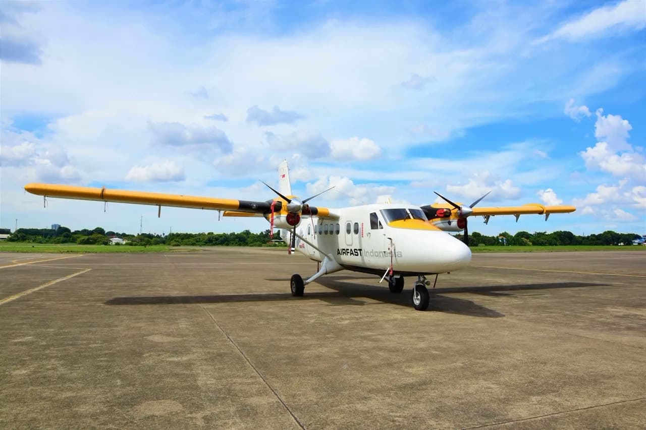 Front view of the PK-OCI Twin Otter Series 400 aircraft on the ground.