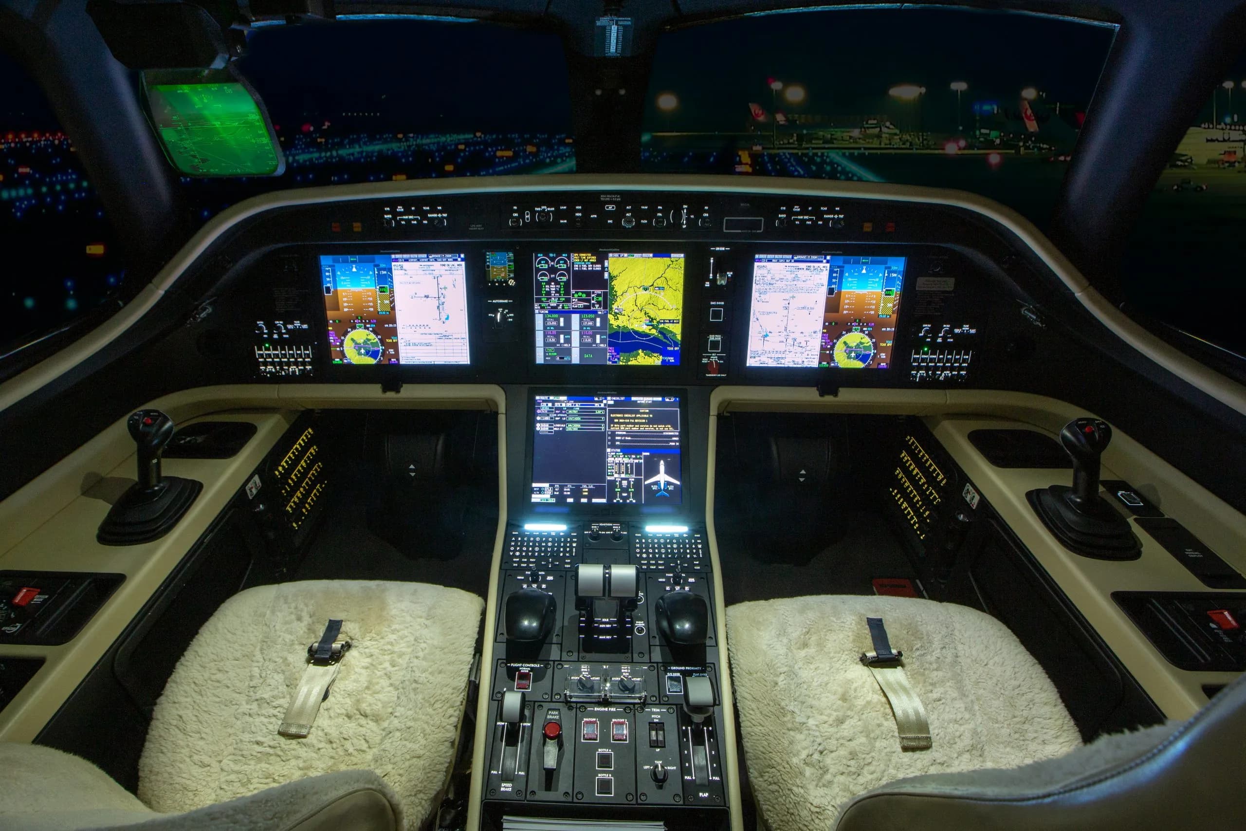 The cockpit of an Embraer Phenom 300E with advanced avionics.