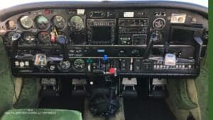 View of the cockpit instrument panel of the Piper Lance II aircraft.