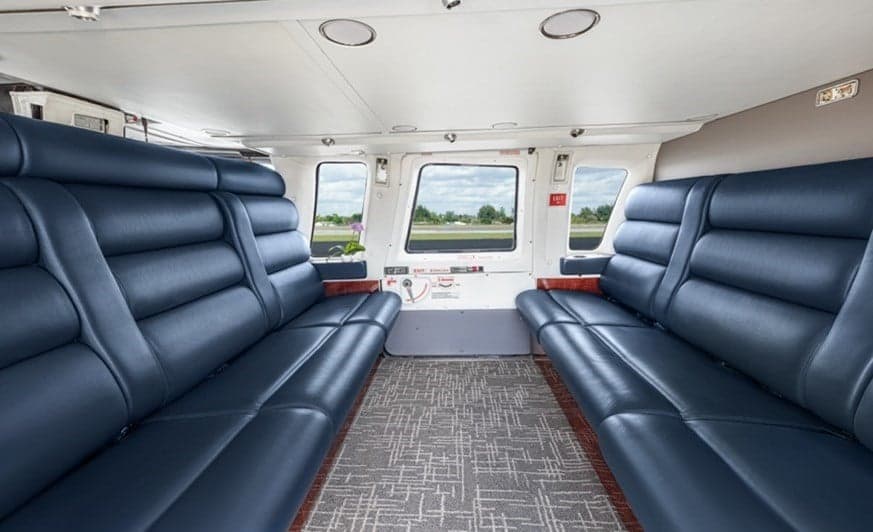 View of the interior cabin with blue leather seats.