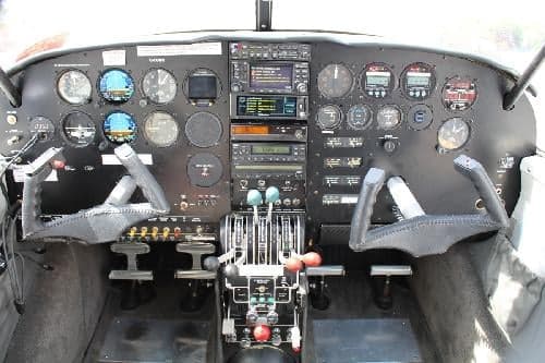 The instrument panel of a Piper PA-28-181 Archer II features a variety of gauges and controls.