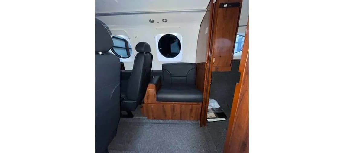 View of the aircraft interior showing the cabin seats.