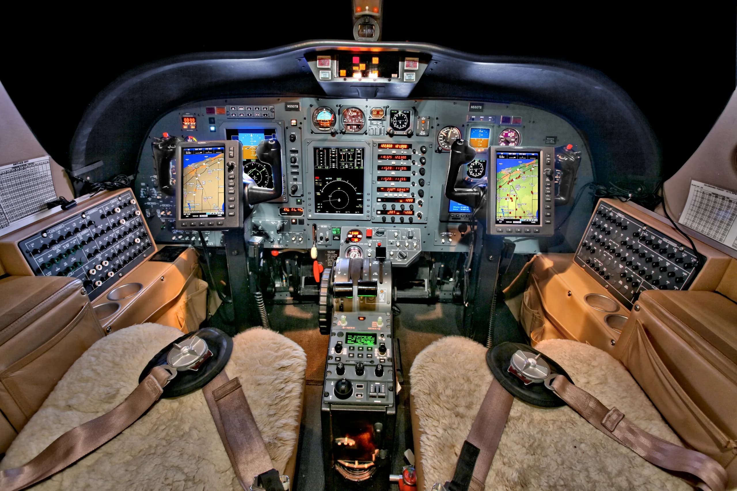 The cockpit of a Cessna Citation CJ1+ featuring the instrument panel and pilot seats.