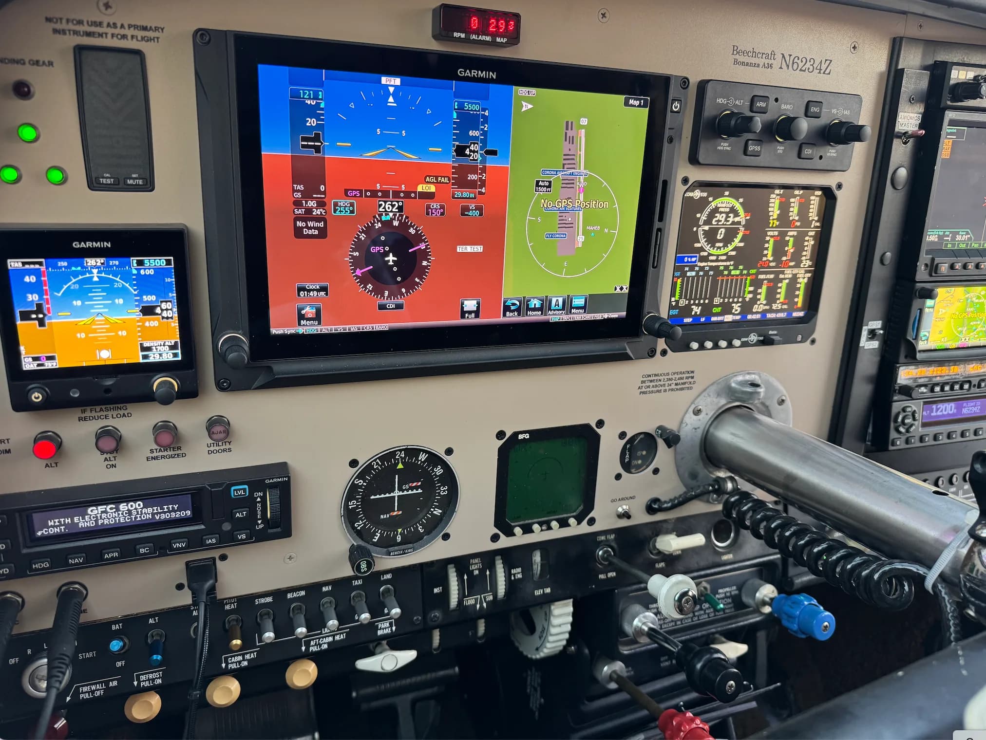Close-up of the Beechcraft Bonanza instrument panel with Garmin avionics.