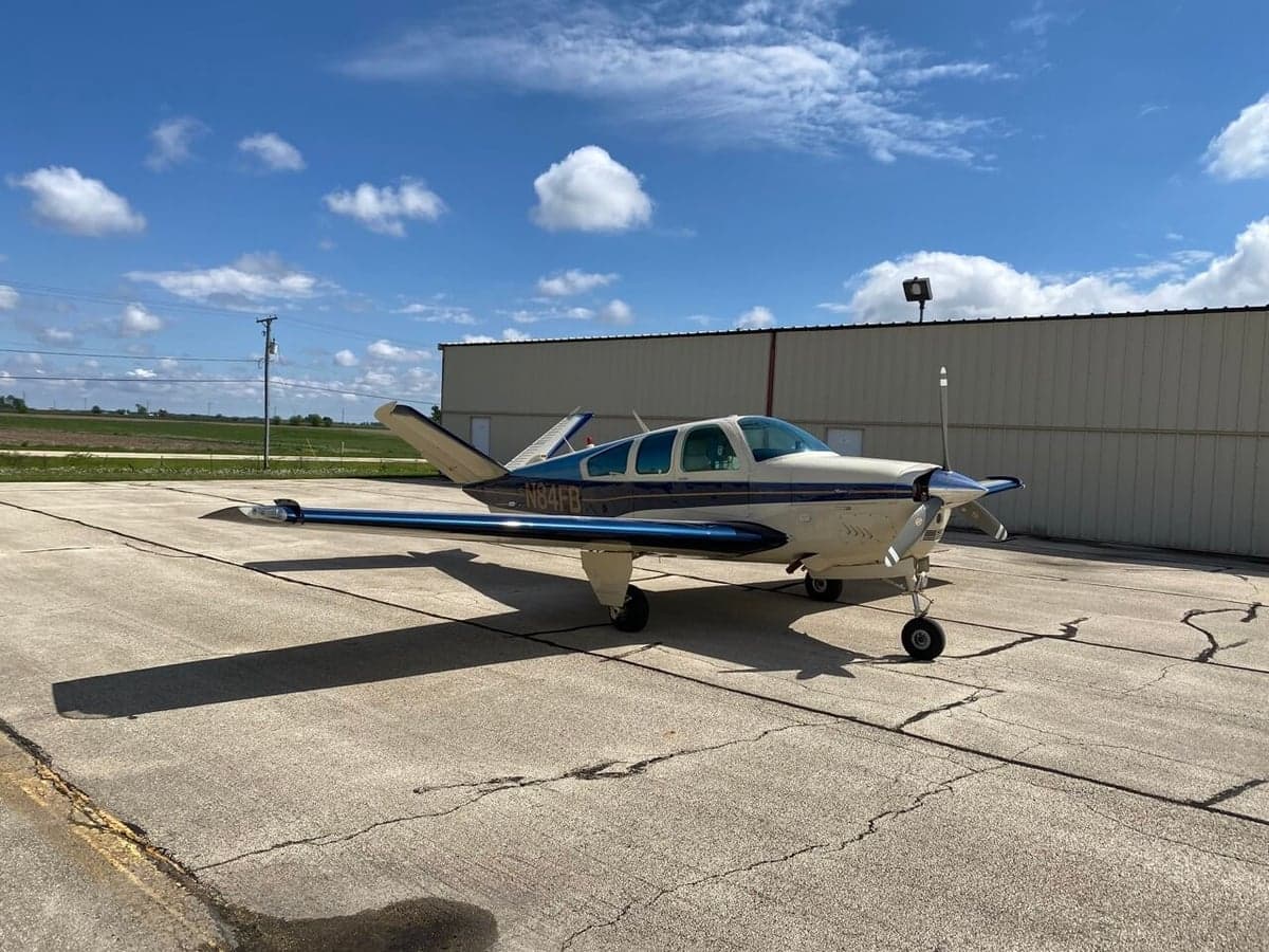 A Beechcraft Bonanza N84FB parked on the tarmac.
