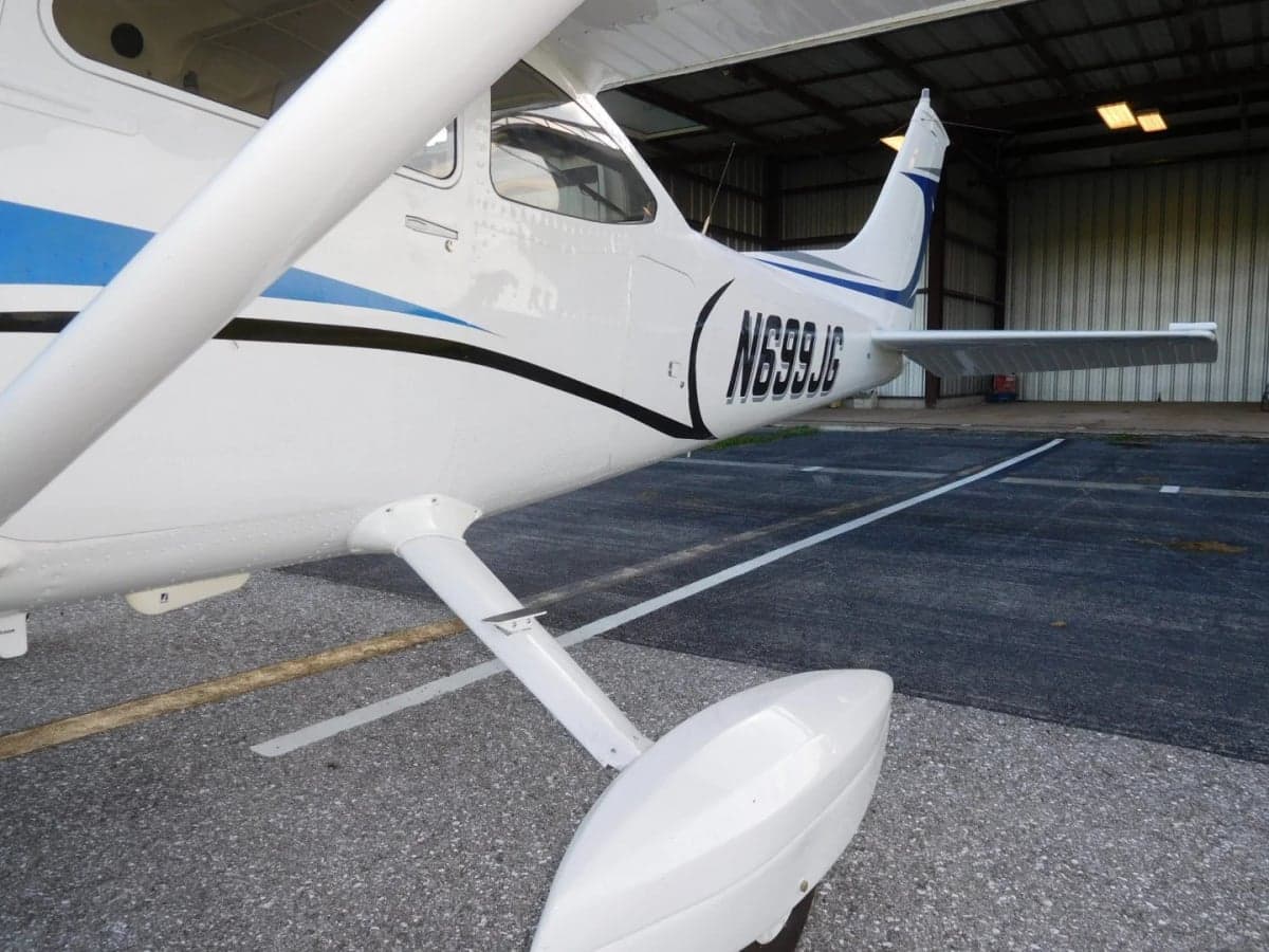 Close-up of the tail of the N699JG Cessna aircraft.