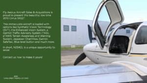 Close-up of a Cirrus SR22T with the door open, showcasing the wing and part of the fuselage.