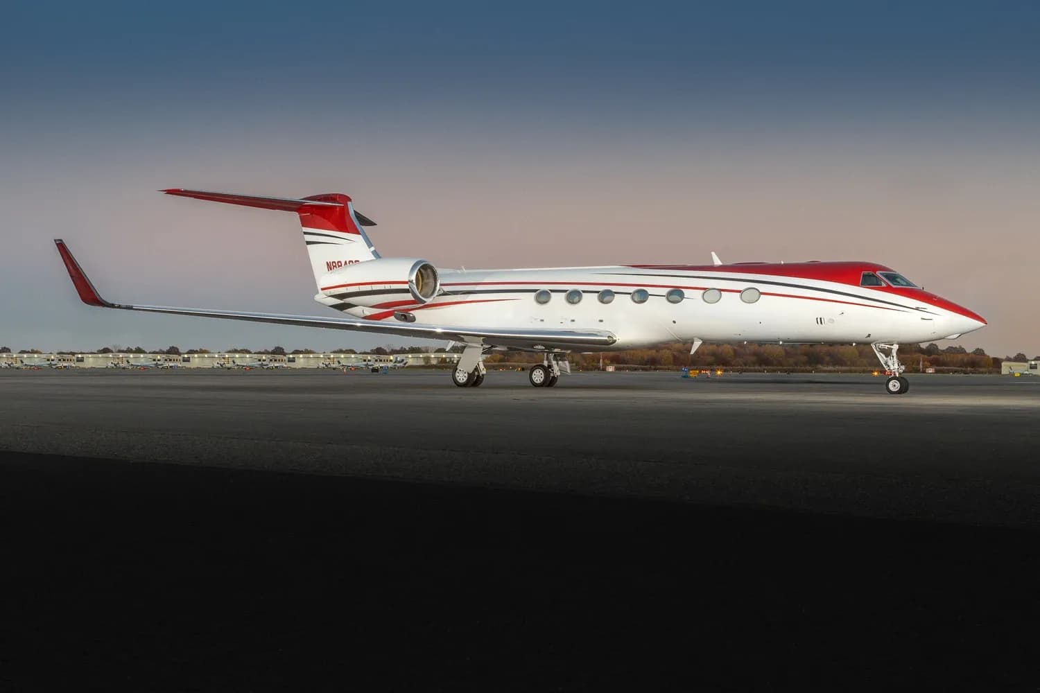 A Gulfstream aircraft is parked on the tarmac.