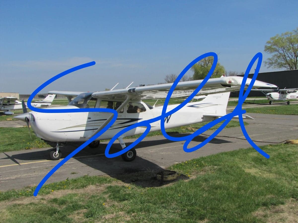 A Cessna 172 Skyhawk aircraft is parked on the tarmac with a SOLD overlay.