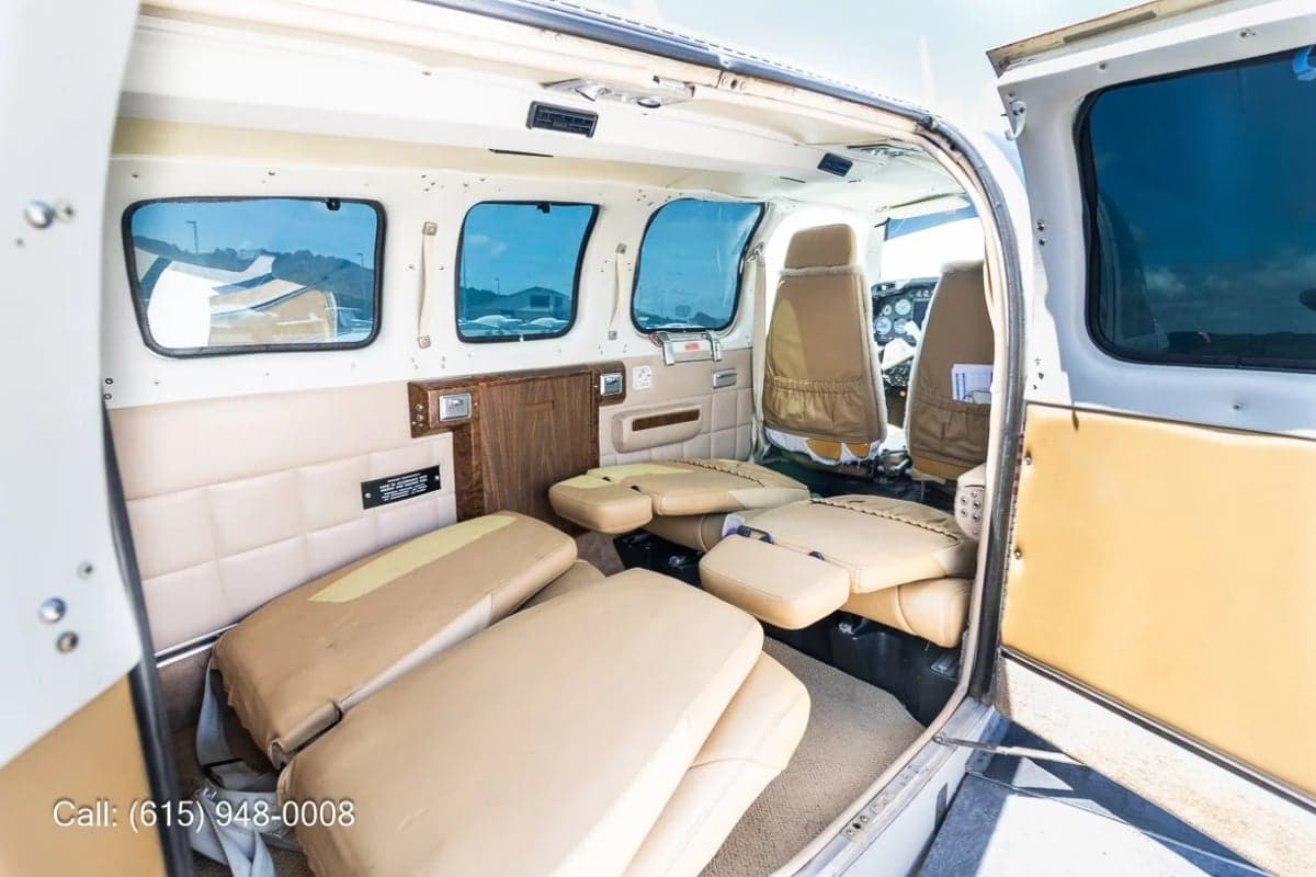View of the interior of a Beechcraft Baron with the door open.