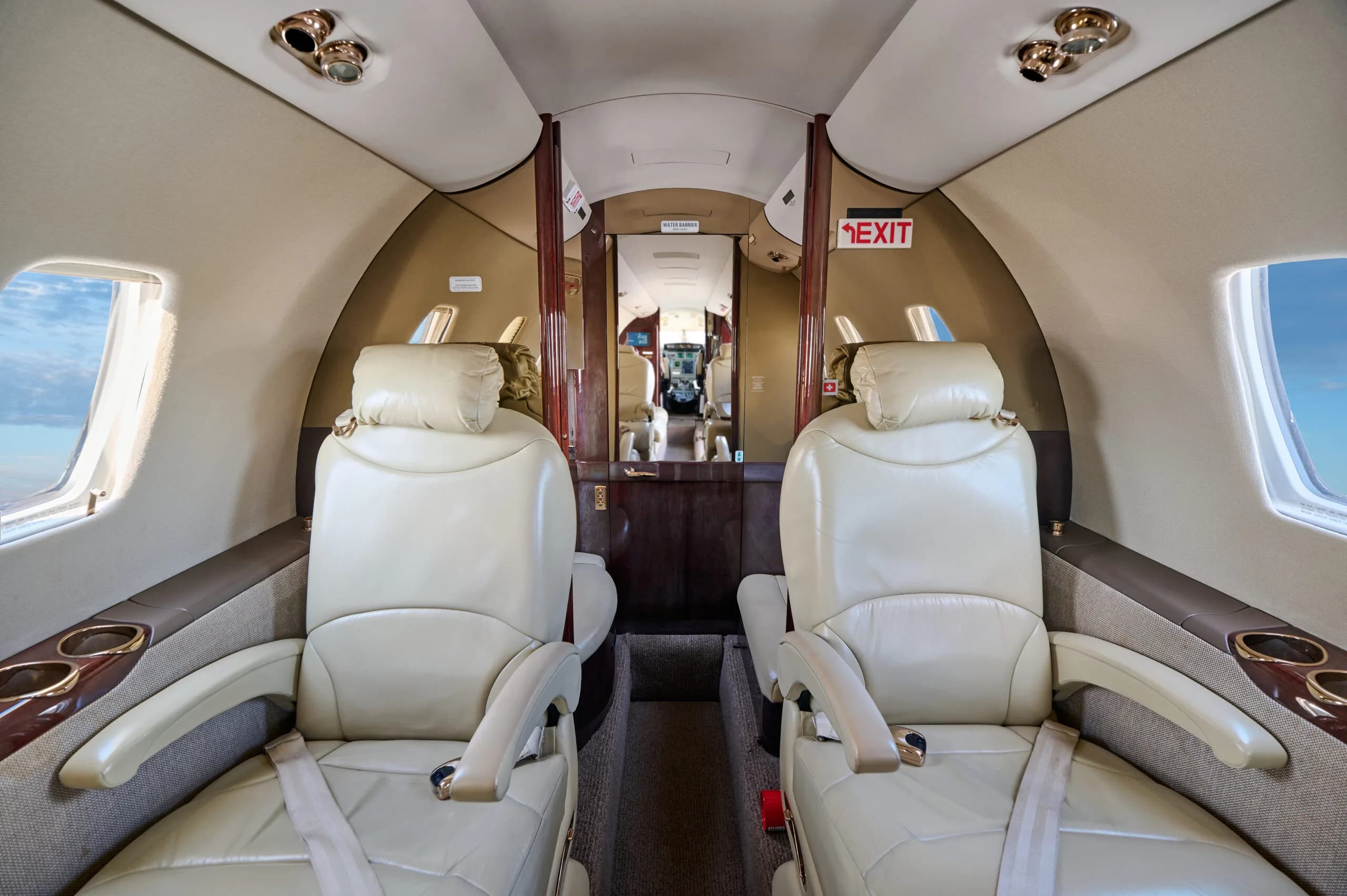 View of the Cessna Citation CJ3 cabin looking towards the rear from the front seats.