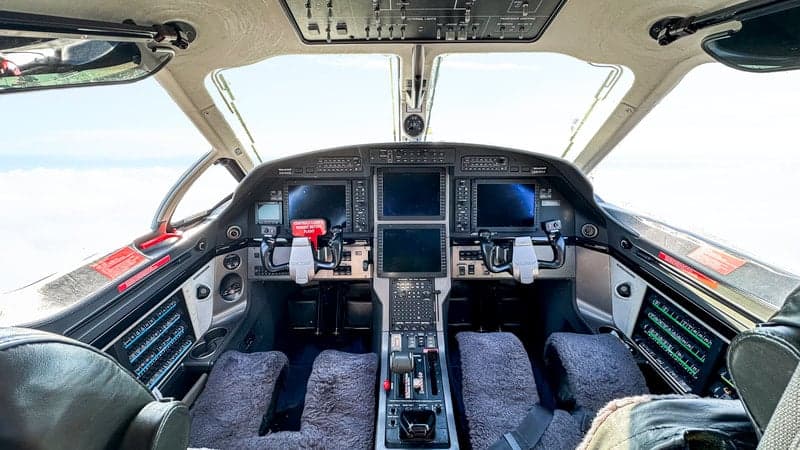 View of the Pilatus PC-12 cockpit with modern avionics.
