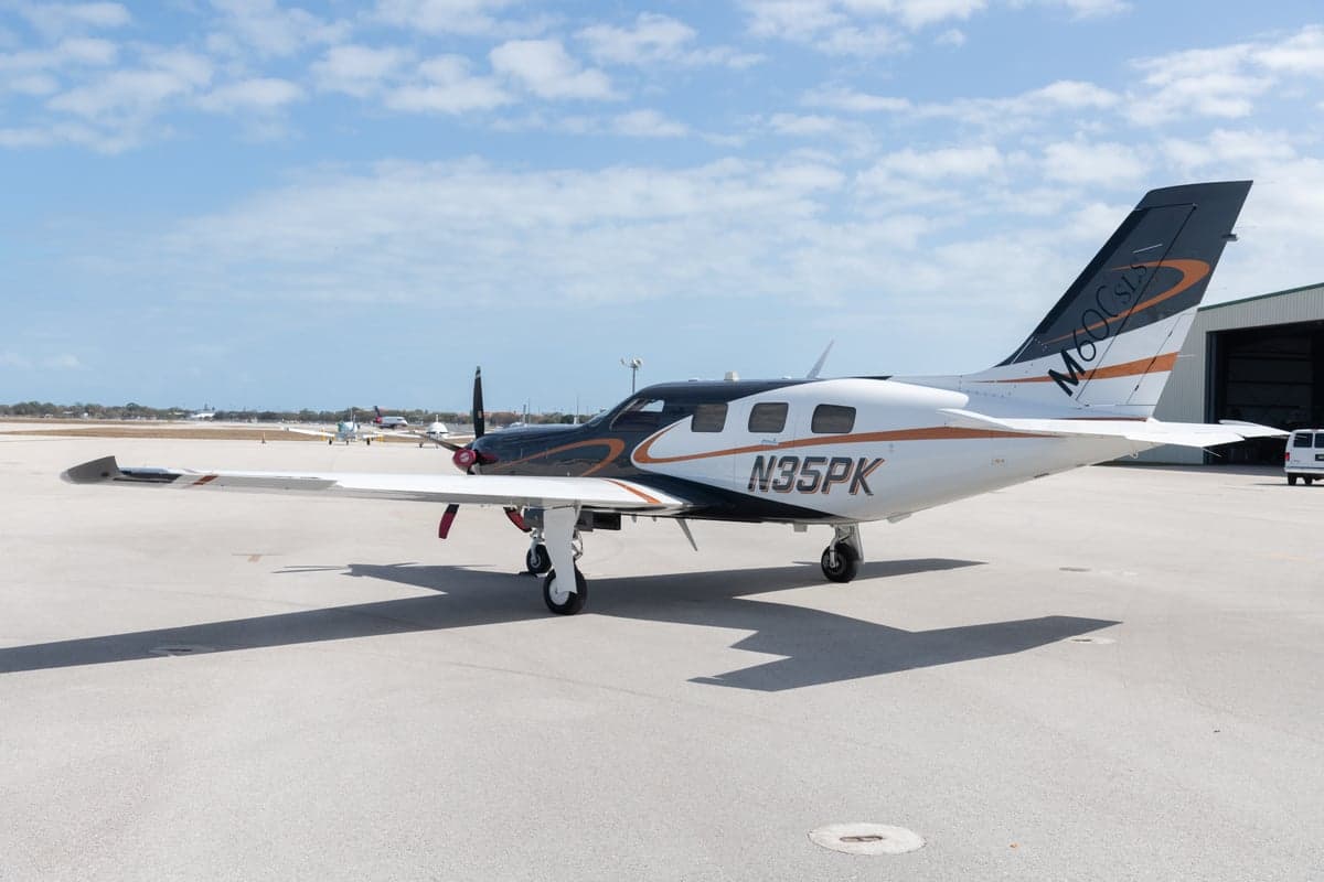A Piper M600 HALO, registration N35PK, is parked on the tarmac.