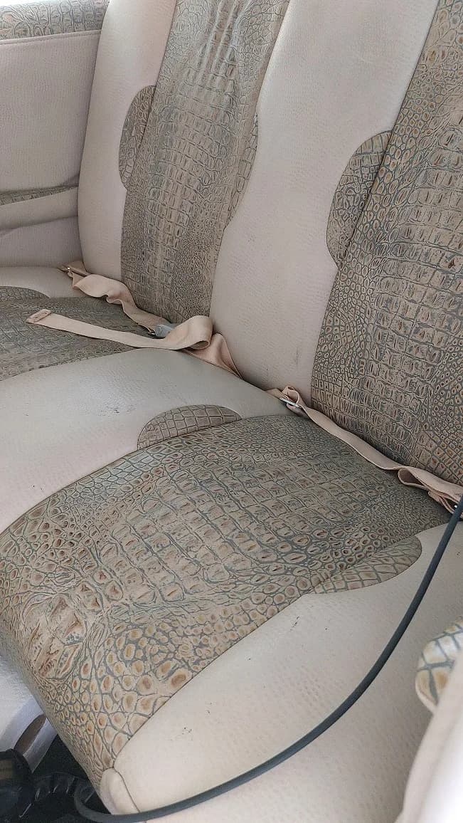 Close-up of the aircraft's interior seats with a patterned design.