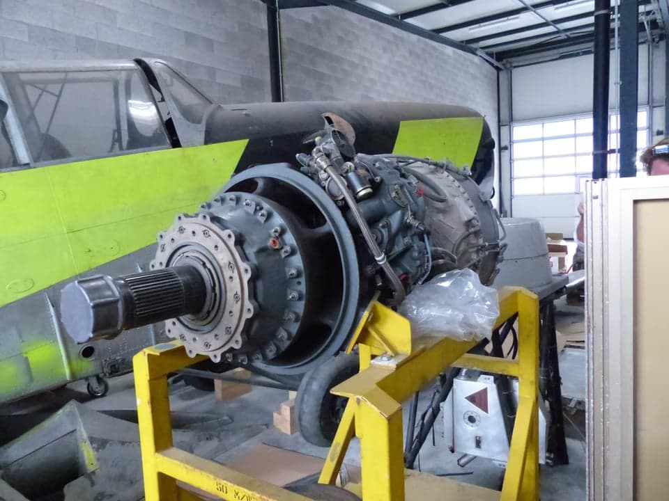 Aircraft fuselage in a hangar.
