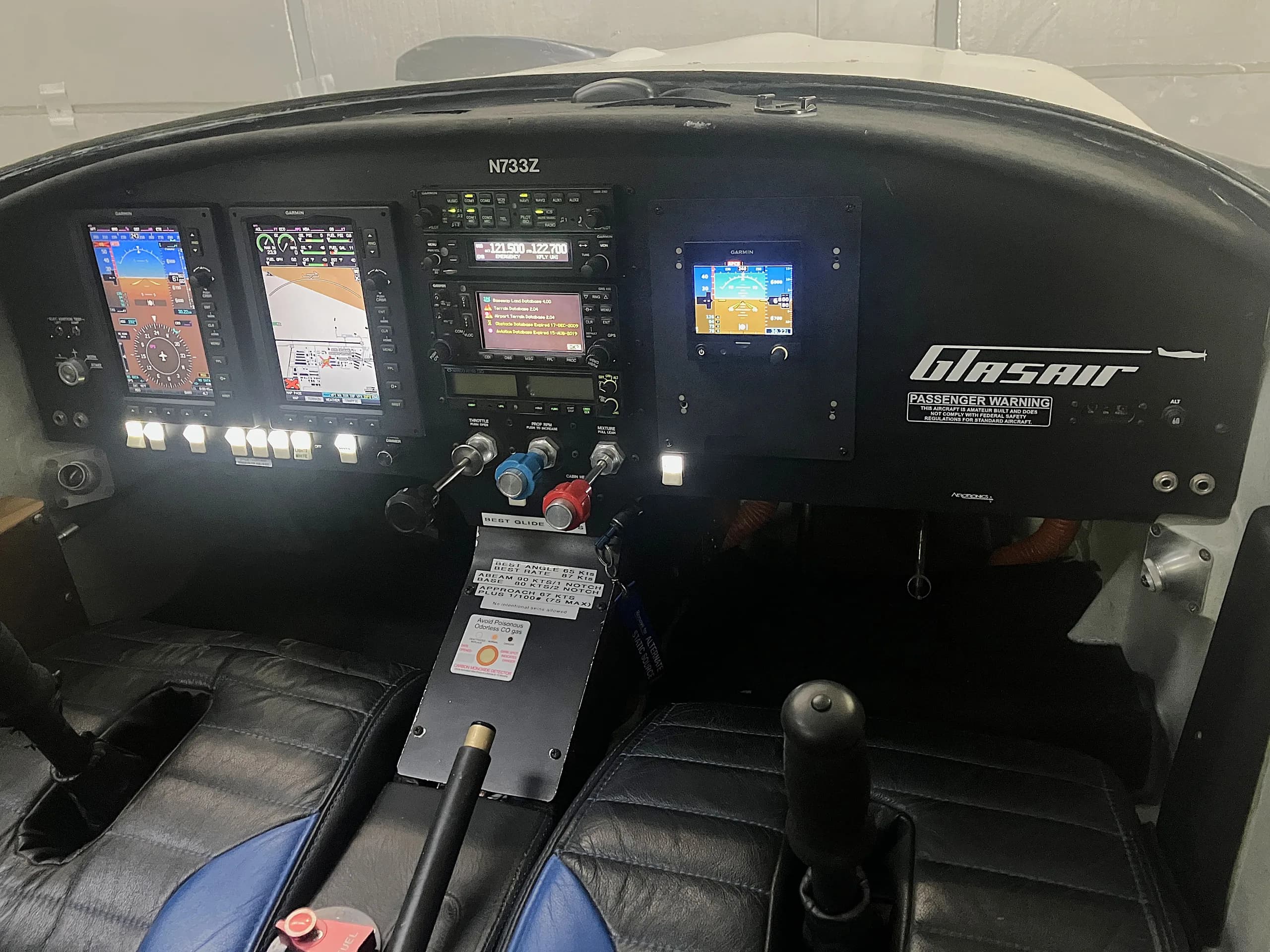 The cockpit of the Glasair Sportsman aircraft, featuring a modern Garmin avionics suite.