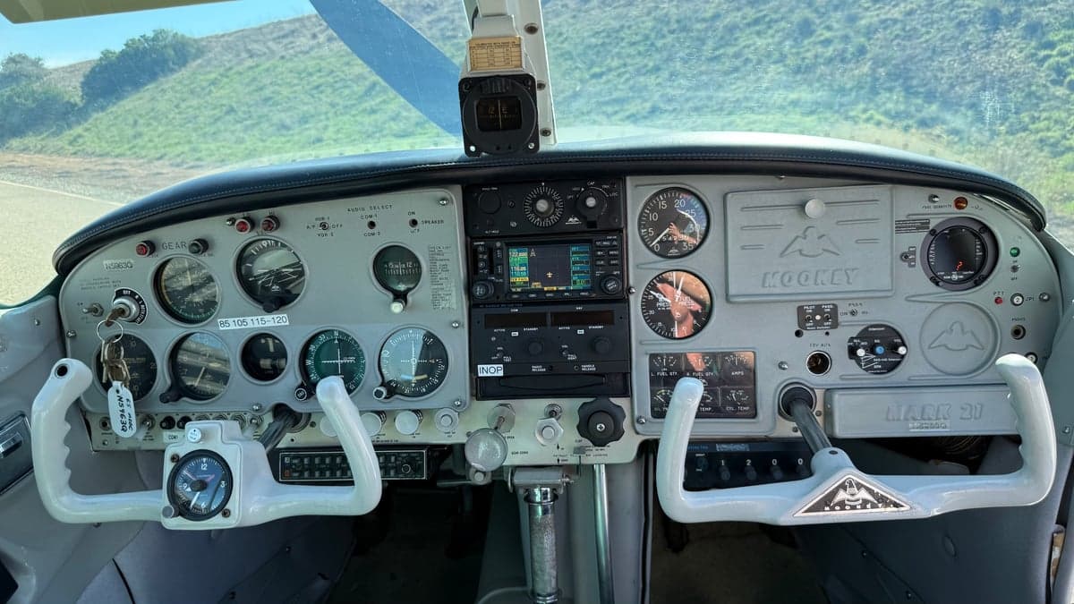 The cockpit of the Mooney Mark 21 aircraft.