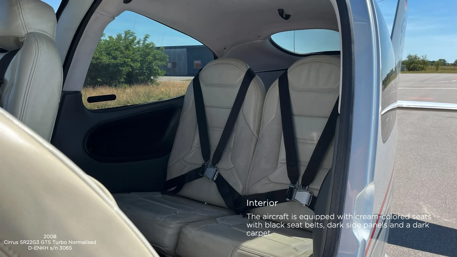 Interior view of the cabin of a Cirrus SR22G3 GTS Turbo Normalized, showing the seats and seatbelts.